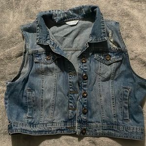 Distressed jean vest size xl; juniors fit.